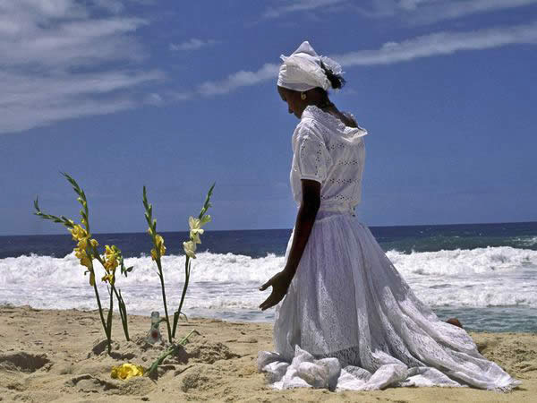 Afro-Brazilian Woman Leaves Offerings