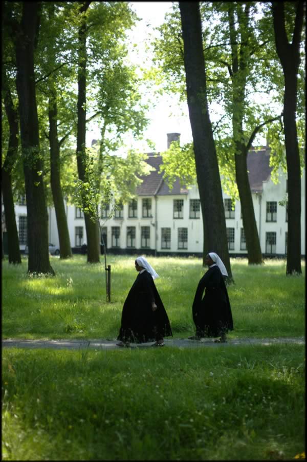 Beguines in beguinage of Bruges