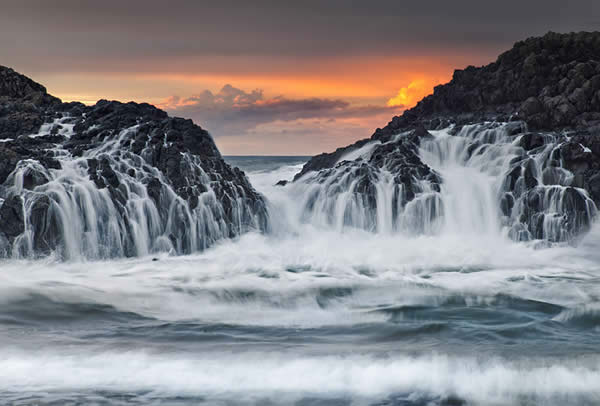 Crashing waves at Sunset