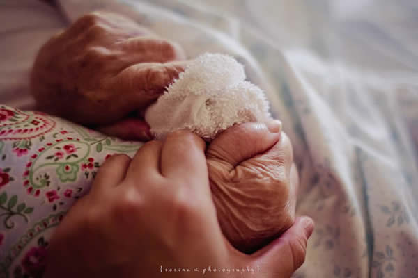 Grandmas Hold our Tiny Hands