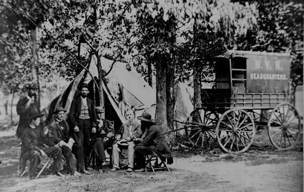 A New York Herald Tribune Wagon and Reporters in the Field