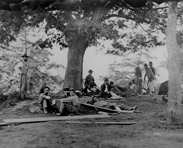 Wounded Soldiers Being Tended in the Field