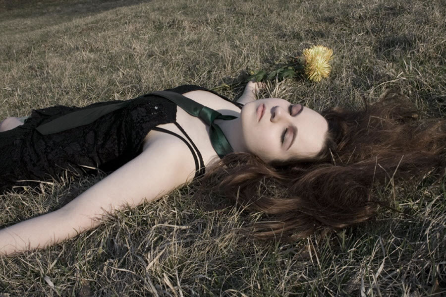 Sleeping Beauty Next to Flowers