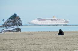 lonely man at beach