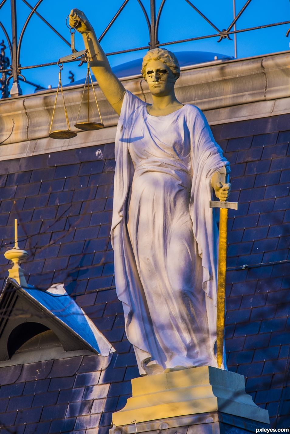 Lady justice blindfolded no more