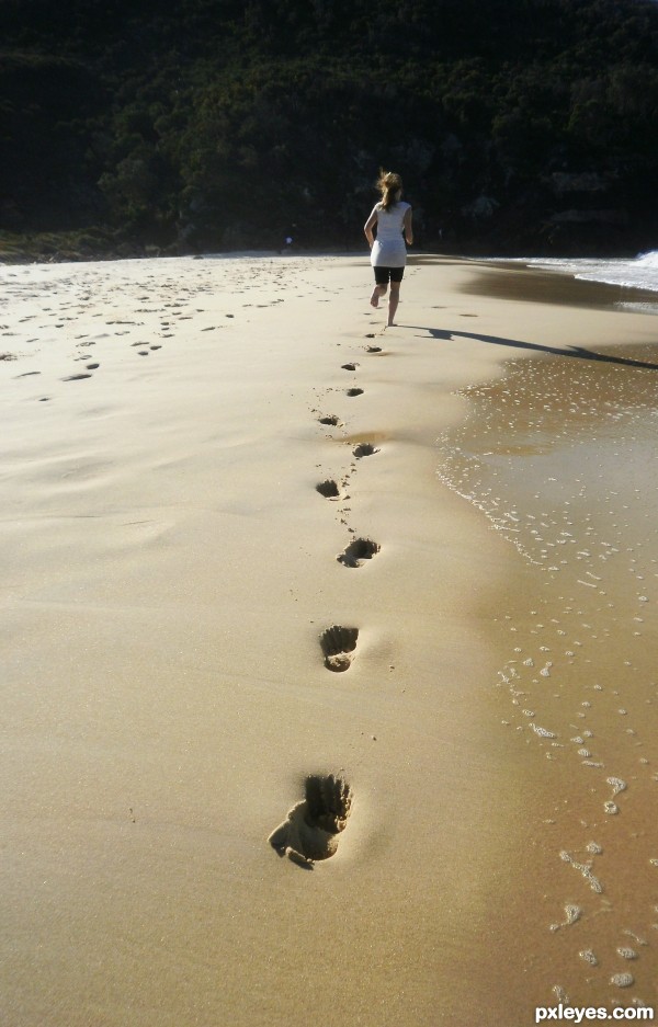 Footprints in the sand.