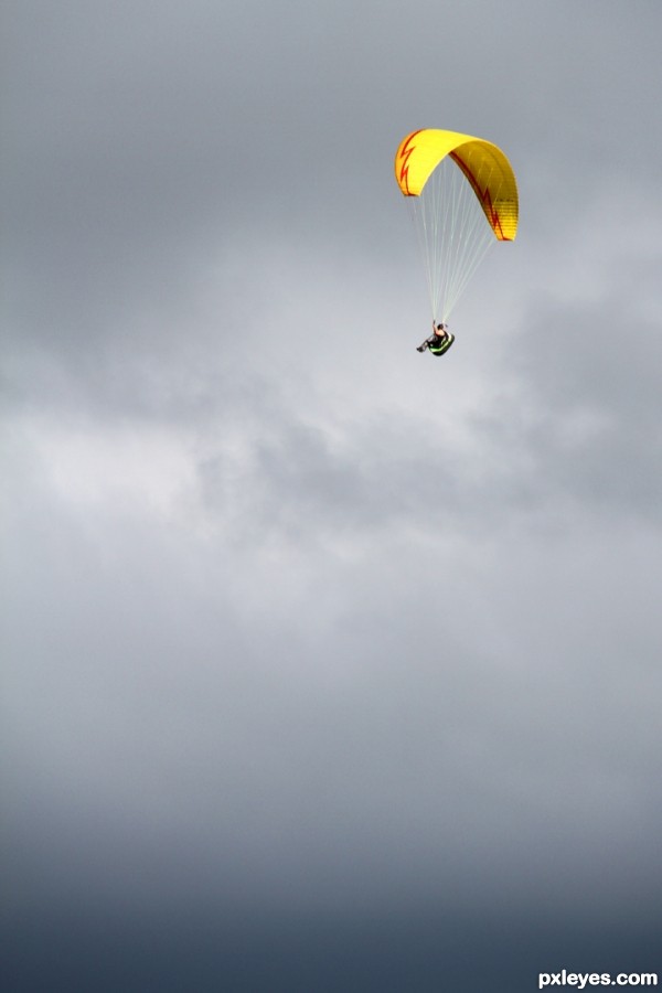 Catching the wind under heavy sky