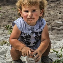 Coleplayinginthedirt