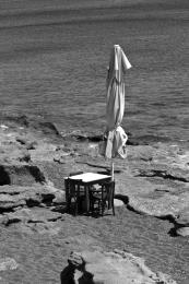 Empty table by the sea