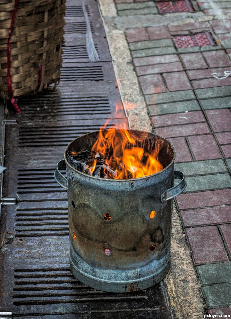 Burning rubbish or keeping warm?