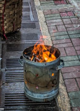 Burning rubbish or keeping warm?