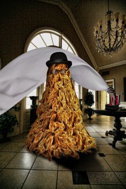 Cousin Itt in Reception Room with THING Pashing