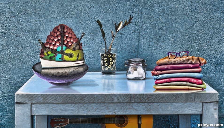 Bowl on Blue Table Still Life with Guitars Boat and Red Grapes