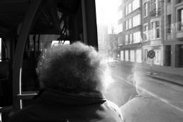 Curly man on the bus