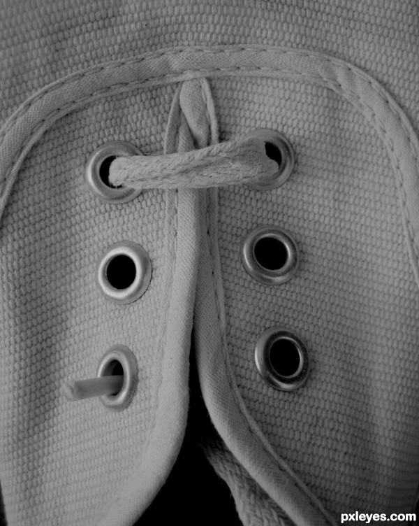 Shoe lace holes.