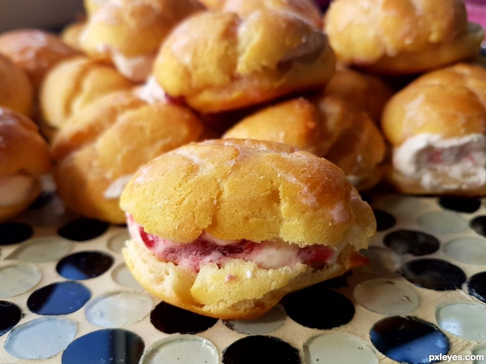 Cream puffs with raspberry & whip cream filling