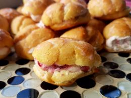 Cream puffs with raspberry & whip cream filling Picture