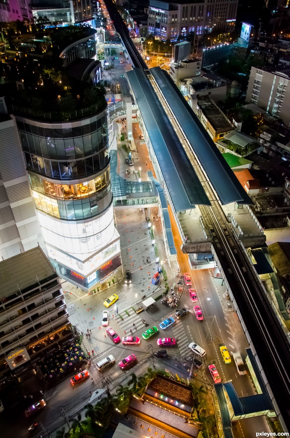 Flying over the city at night. photoshop picture)