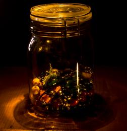 A jar half full of worry beads