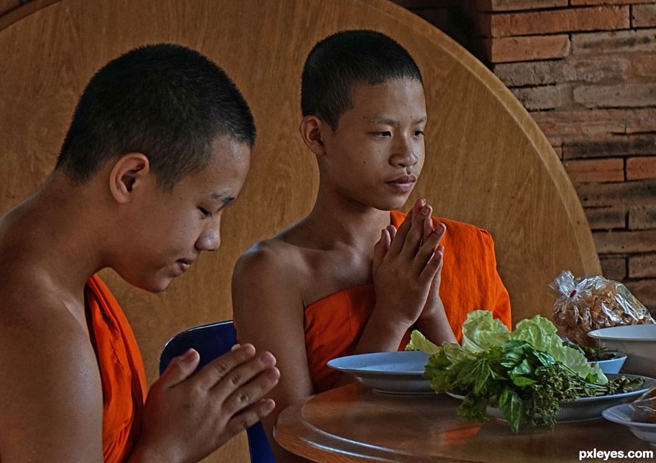 Monks Munch Meal in Monastery