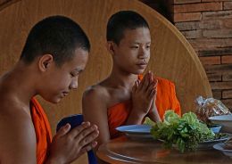 Monks Munch Meal in Monastery