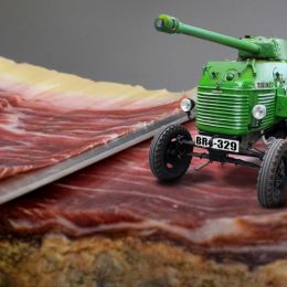 TractorTankParkedonSlicingBaconPlatform