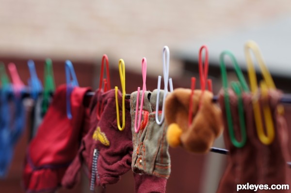 Mini clothespins for dolls clothes.