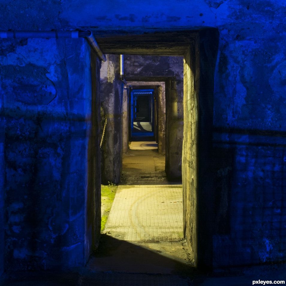 blue and yellow illuminated corridor