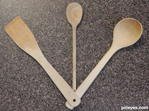 Wooden utensils on kitchen countertop