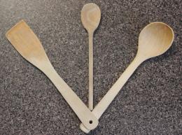 Wooden utensils on kitchen countertop