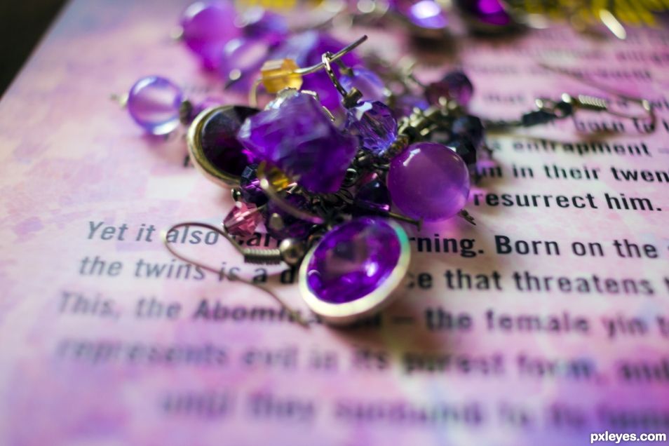 Purple Earings on Purplish Book Cover