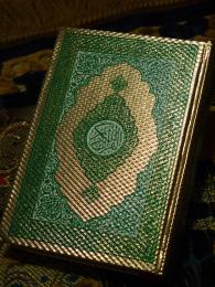 Holy Quran on prayer mat