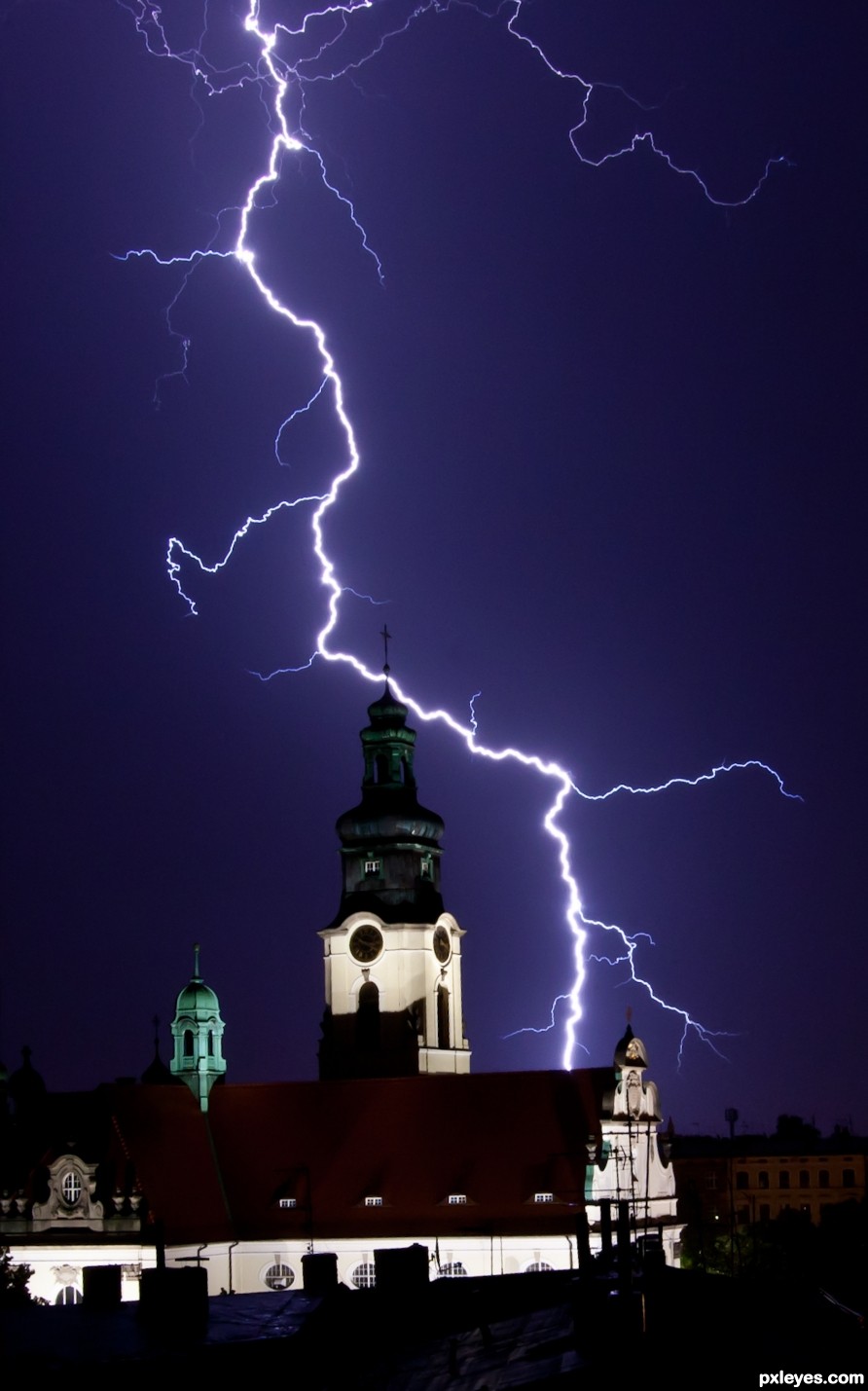 Church Illuminated by Lightning 