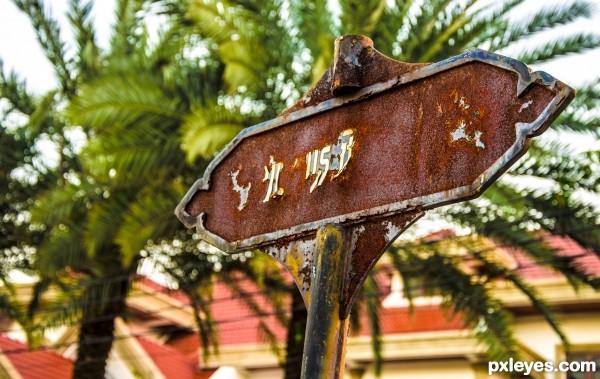 Rusty street sign