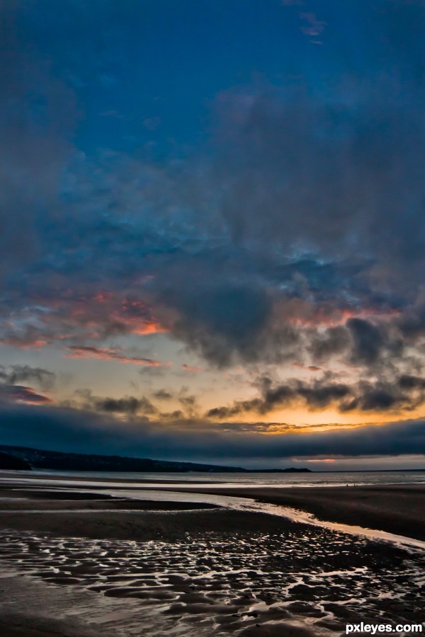 A wet sandy beach