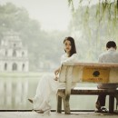 sitting on a bench source image