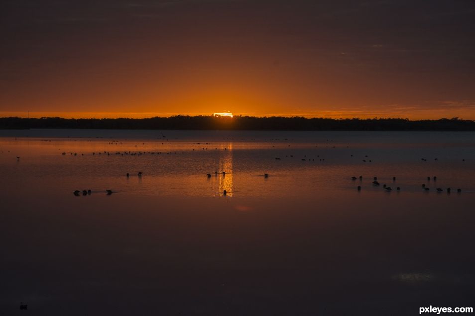 Sunset over water