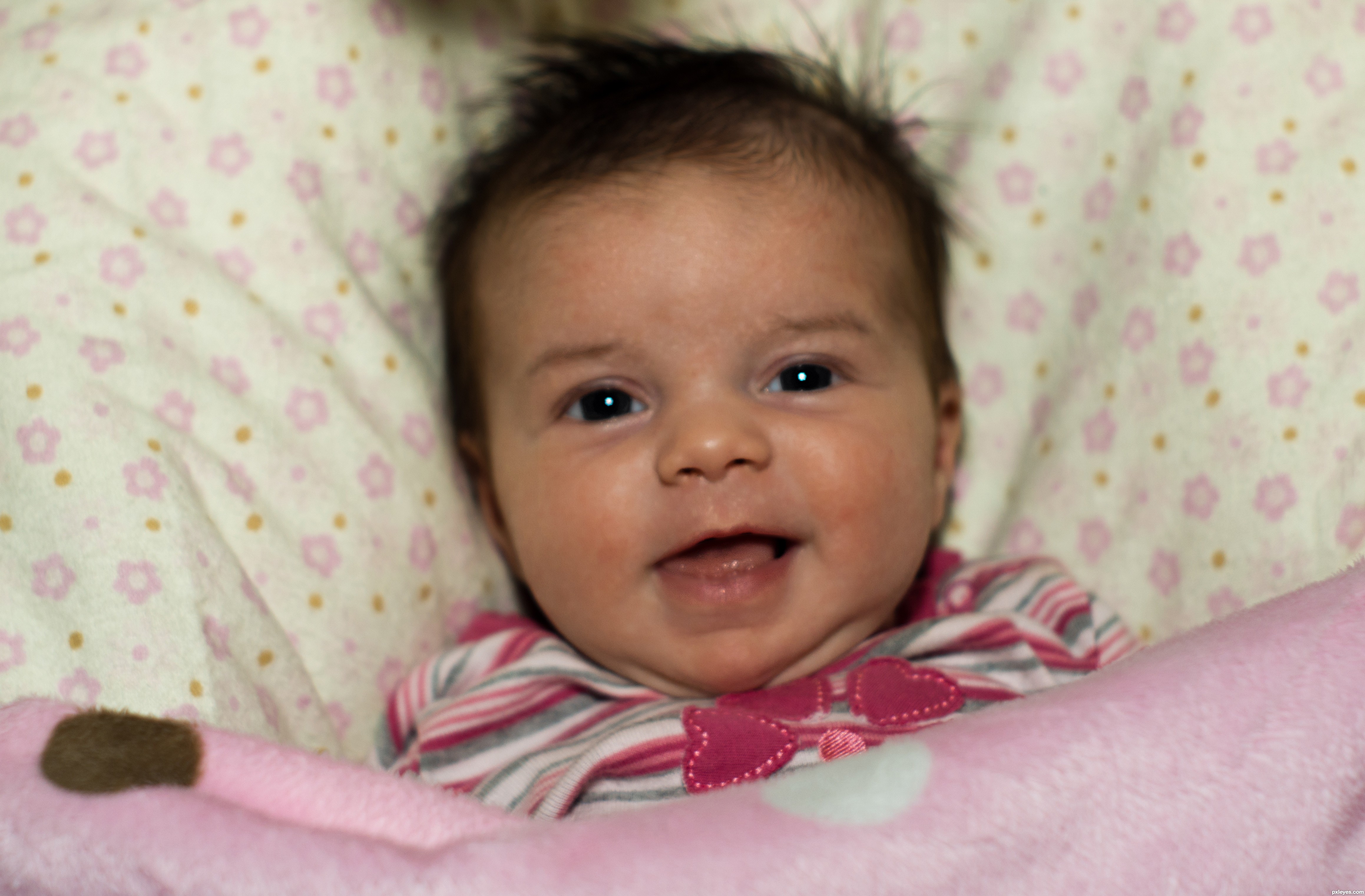 1 month old baby smiling