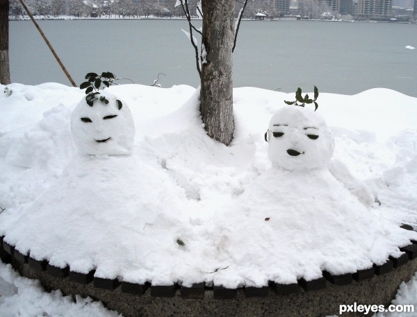 twins by frozen lake