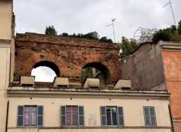 Roman arch and modern building