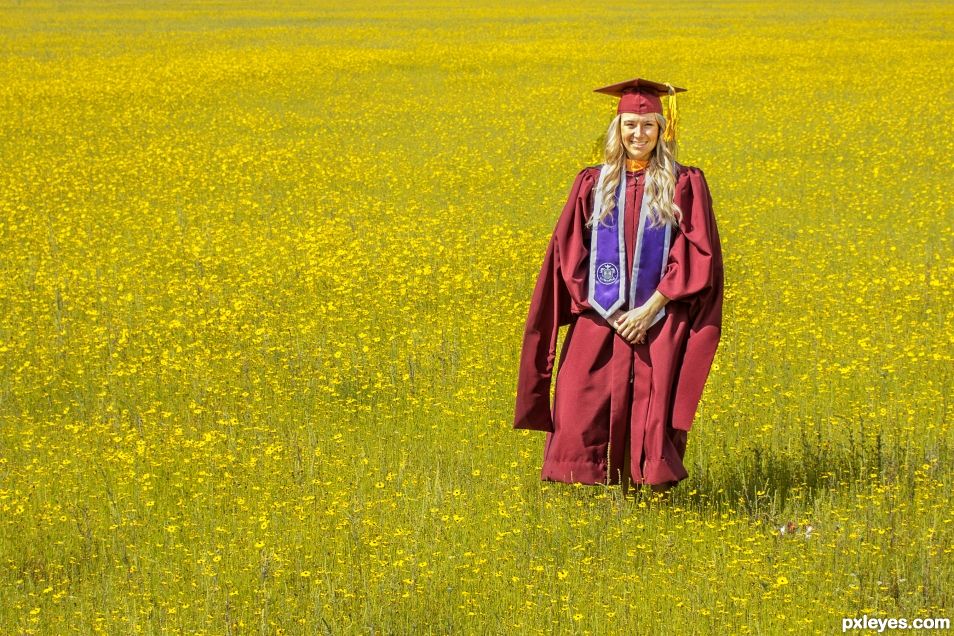 Graduate in a field of wild Spring flowers.