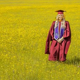 GraduateinafieldofwildSpringflowers