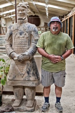 Chinese statue with tourist