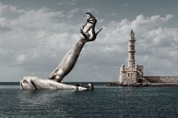 Legs Up at the Lighthouse Statue