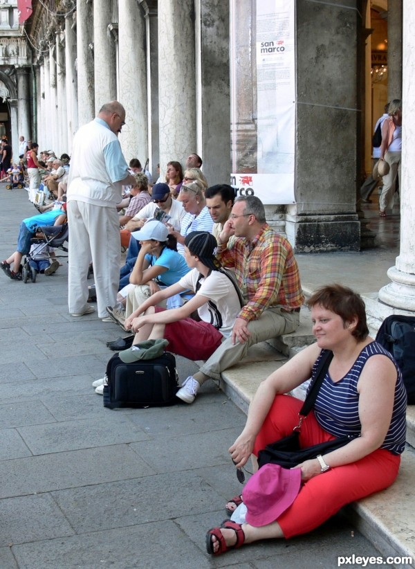 Tourists relaxing in Venice
