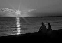 Lovers admiring Sunset