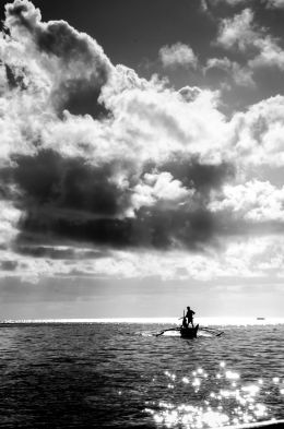 fisherman way back home at sunrise...