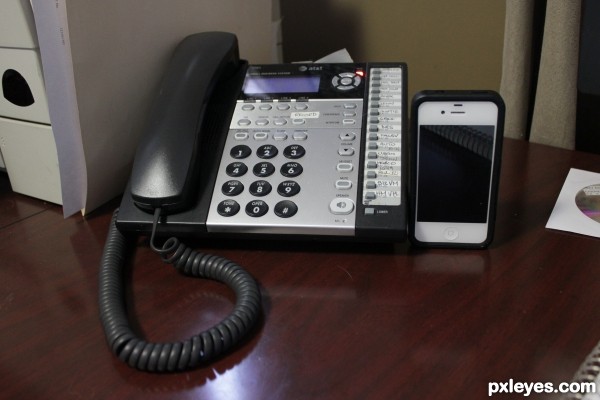 Desk with phones printer cd 