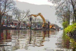 water, boats and workers