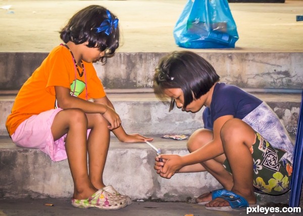 Two kids playing at the middle of the night